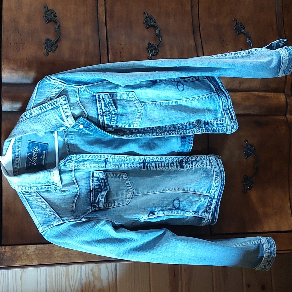Jean jacket size Large, fits like a medium